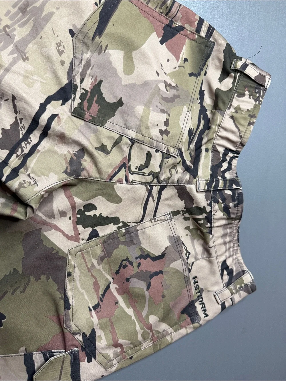 Kid’s Under Armour Storm Camo pants. Size: 10
